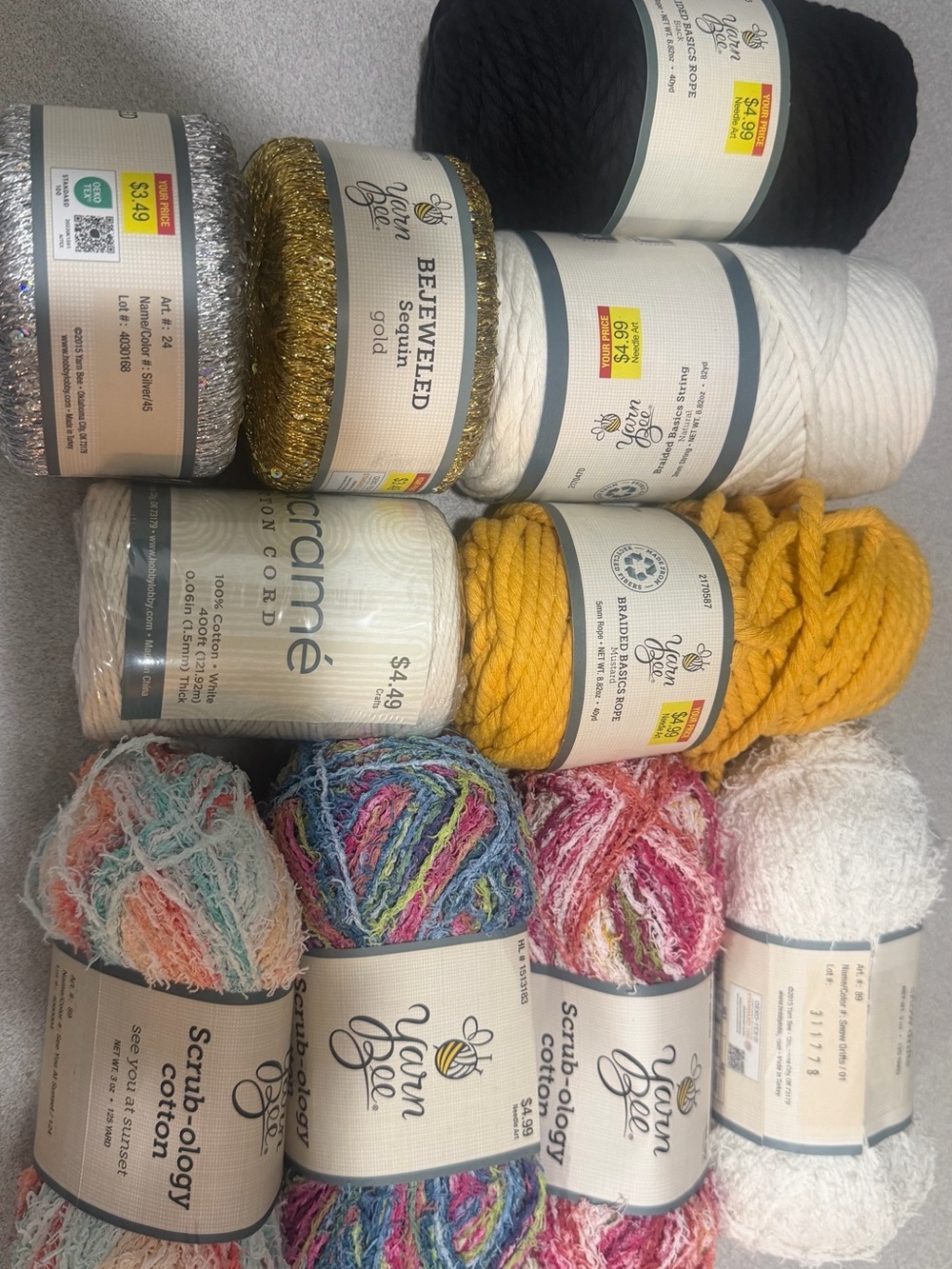 Assorted Yarn Pack in White, Black, Gold, Yellow, Multi from Hobby Lobby